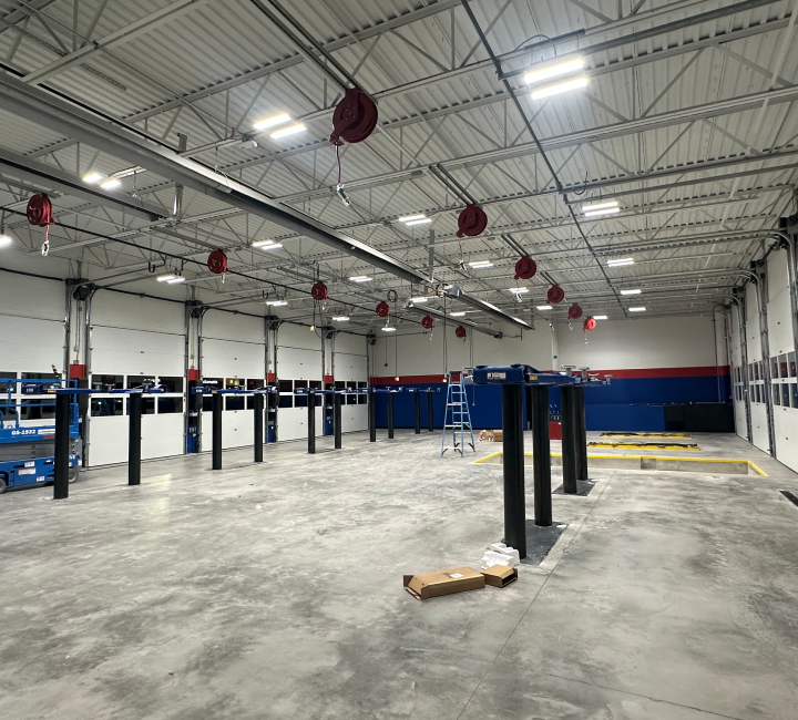 Picture of a garage with car lifts